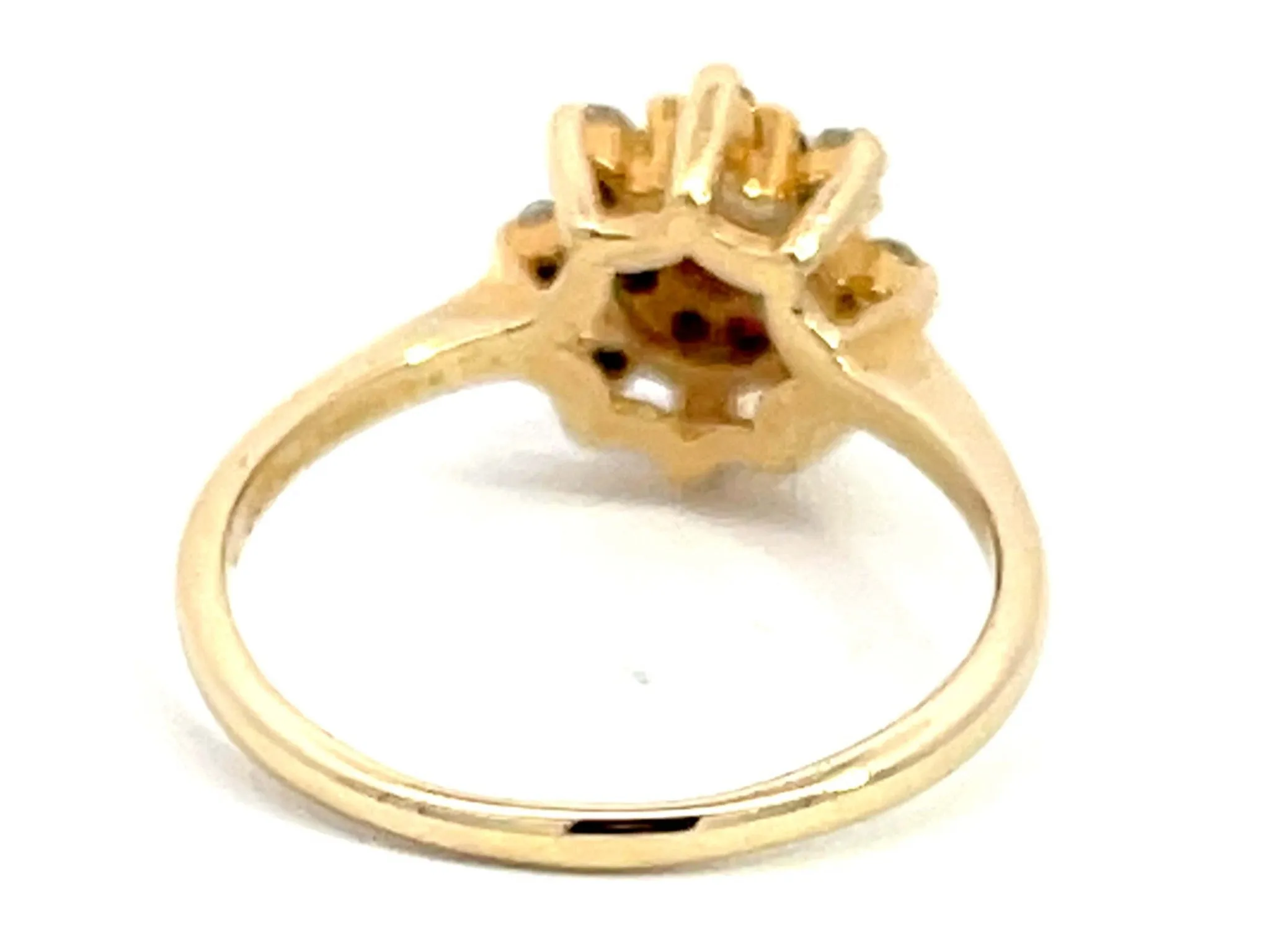 Diamond Ruby Halo Flower Ring in 14k Yellow Gold