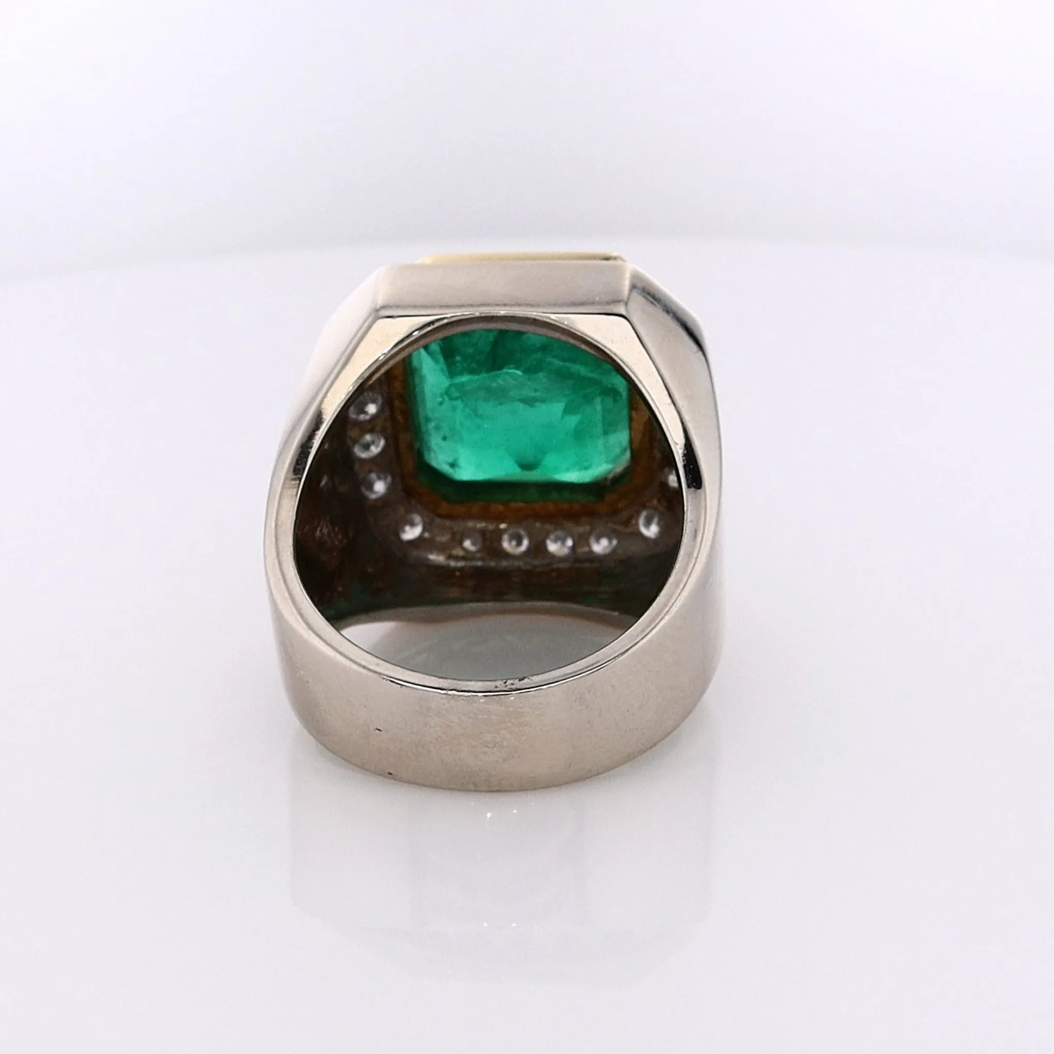 Estate 18 Karat Two-Tone Emerald Ring With Diamond Surround
