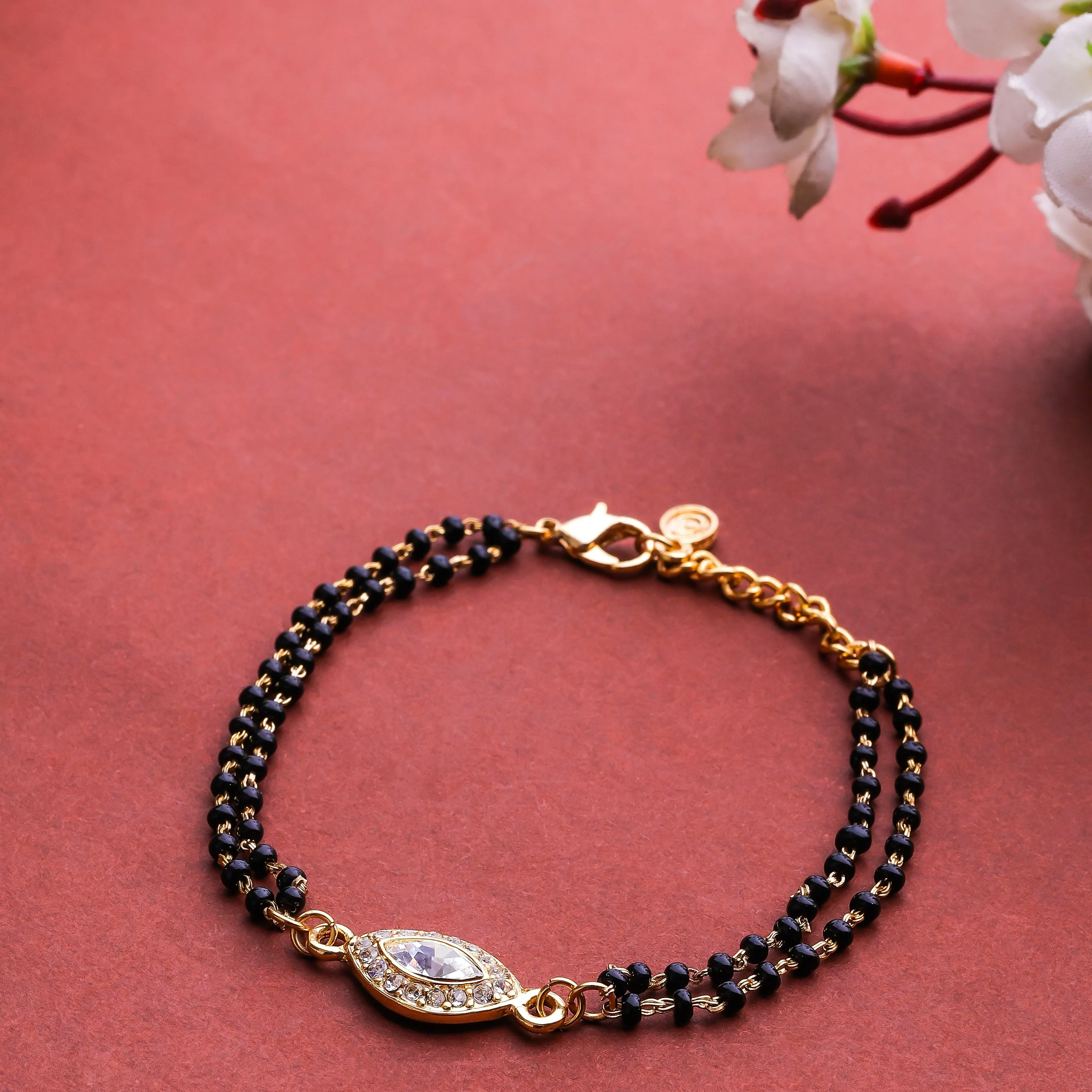 Estele Gold Plated Evil Eye with Black Beads Bracelet with Austrian Crystals & Kundan for Women