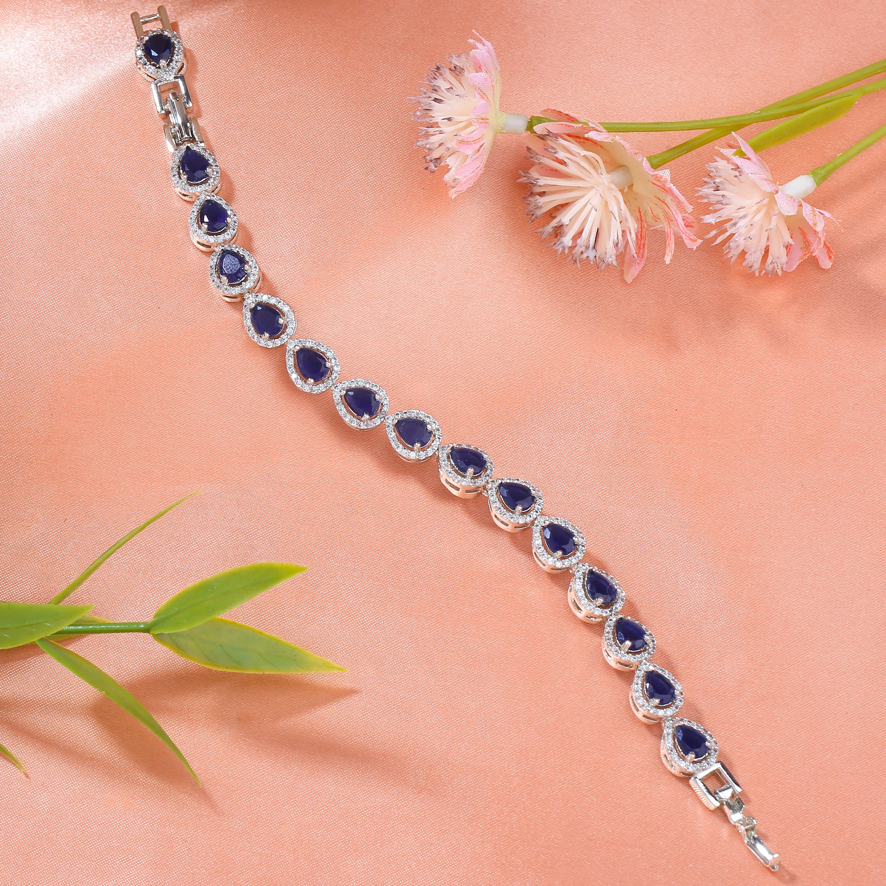Estele Rhodium Plated CZ Drop Designer Charm Bracelet with Blue American Diamonds for Women