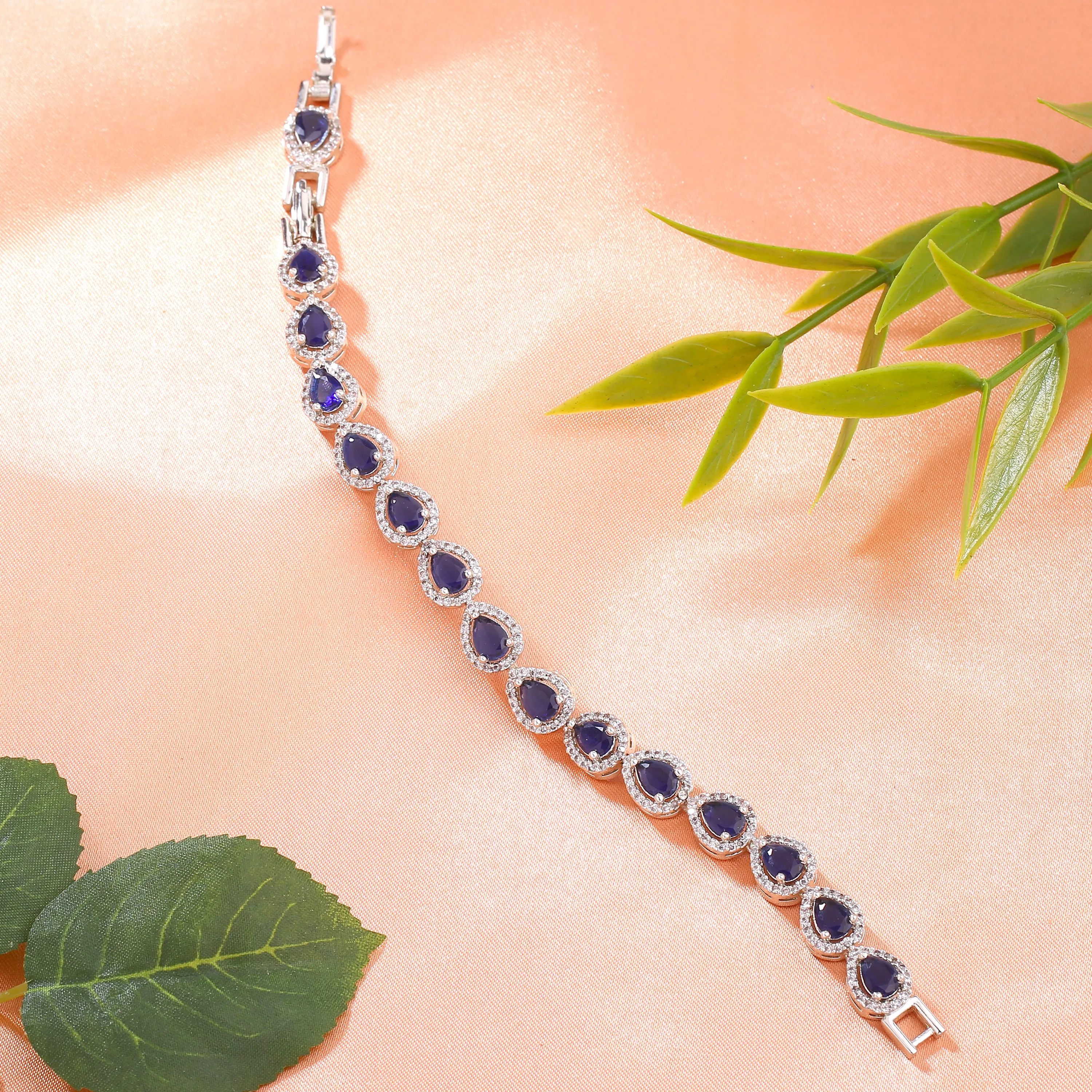 Estele Rhodium Plated CZ Drop Designer Charm Bracelet with Blue American Diamonds for Women