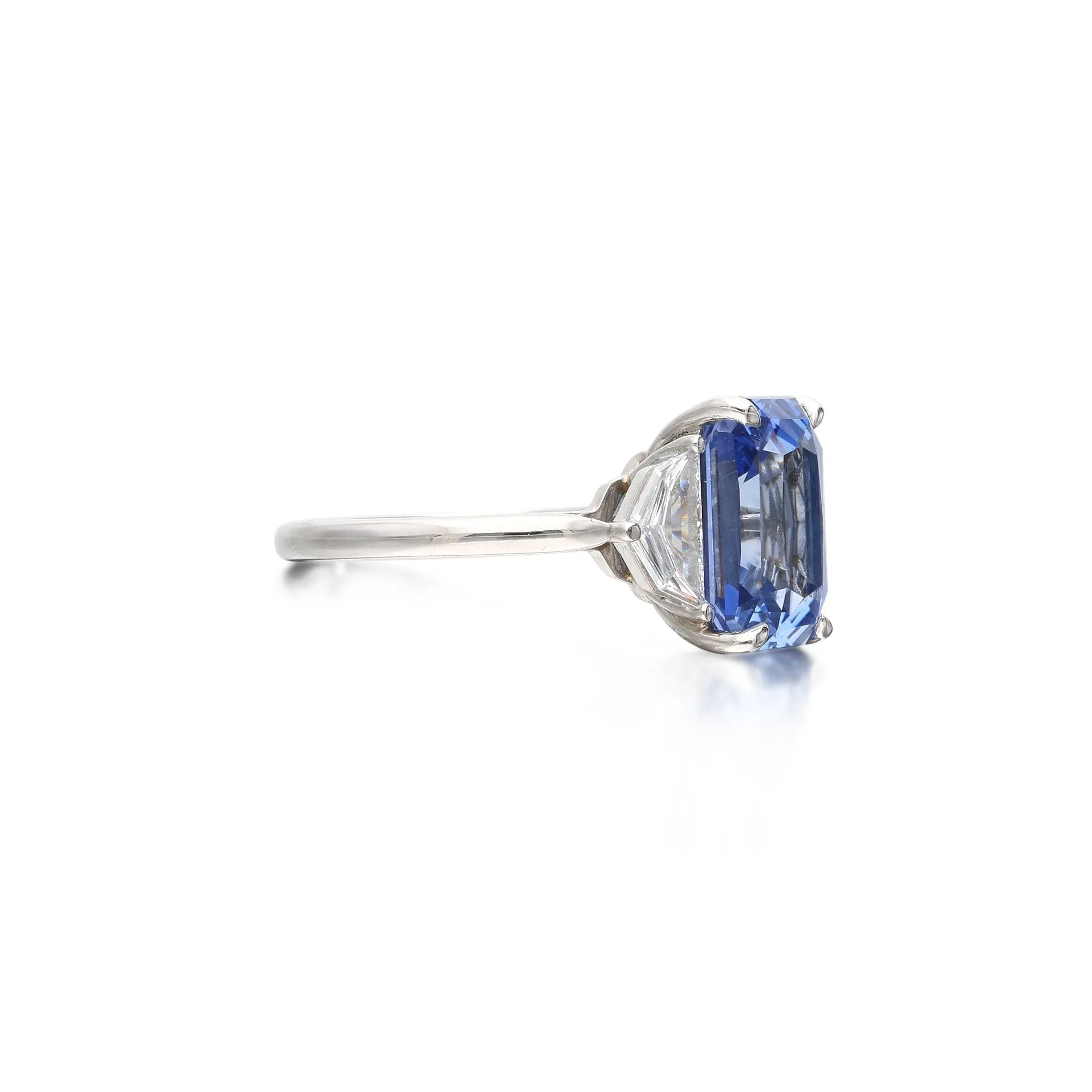 Platinum, 6.86ct Sapphire and Diamond Three Stone Ring