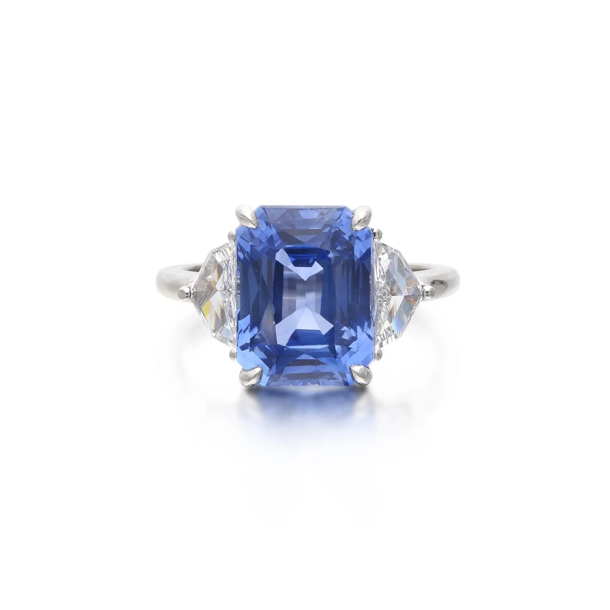 Platinum, 6.86ct Sapphire and Diamond Three Stone Ring
