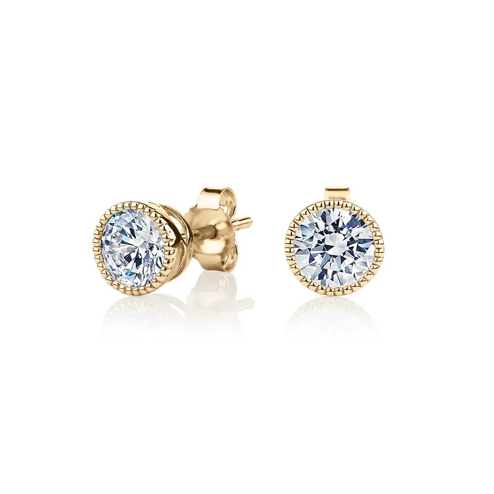 Round Brilliant stud earrings with 1.32 carats* of diamond simulants in 10 carat yellow gold