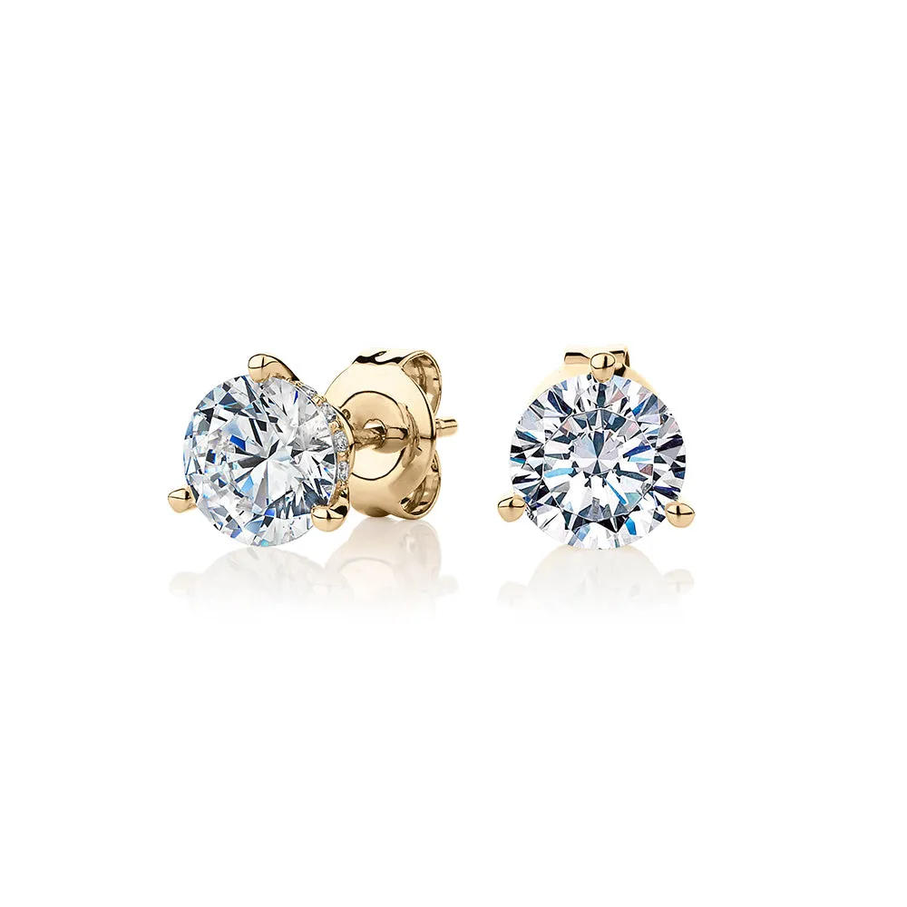 Round Brilliant stud earrings with 2.18 carats* of diamond simulants in 10 carat yellow gold