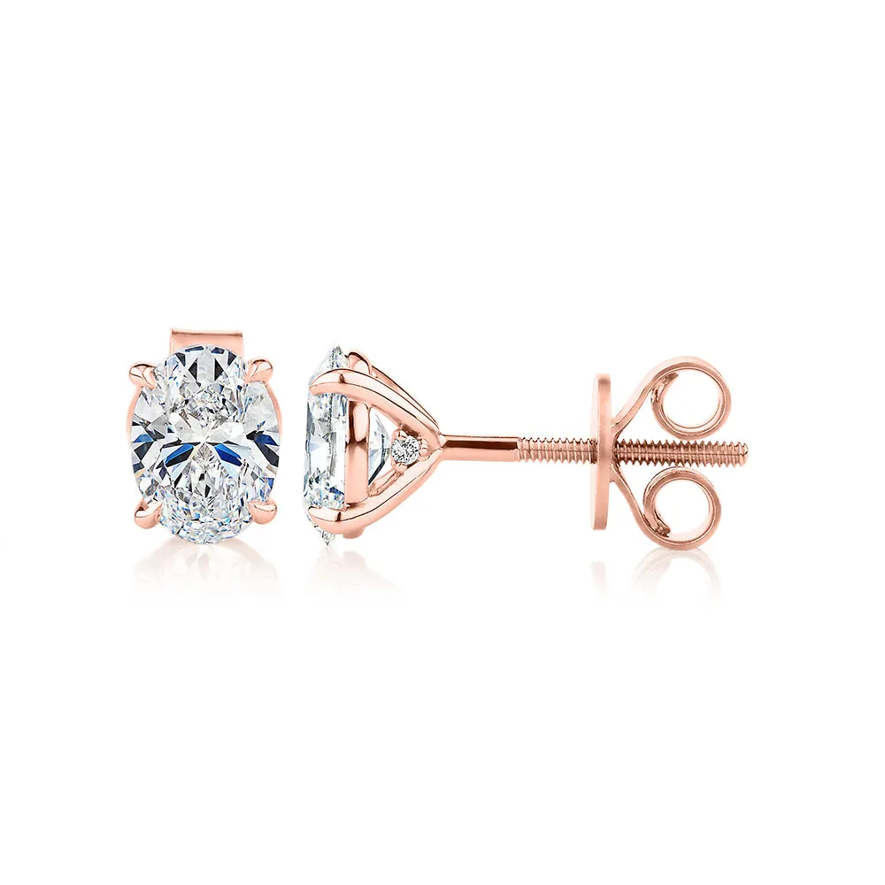 Signature Simulant Diamond 1.40 carat* TW oval stud earrings in 14 carat rose gold