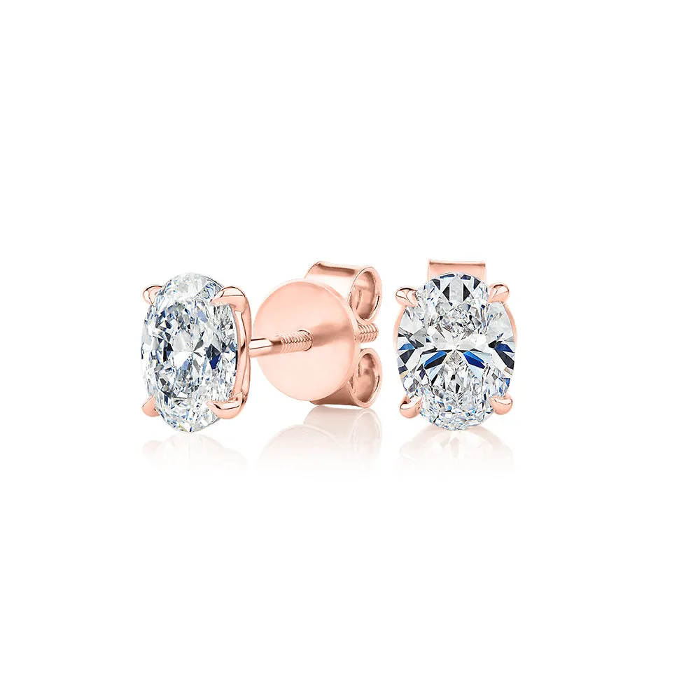 Signature Simulant Diamond 1.40 carat* TW oval stud earrings in 14 carat rose gold