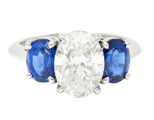 TIFFANY & CO. CONTEMPORARY 4.26 CTW OVAL CUT DIAMOND SAPPHIRE PLATINUM THREE STONE ENGAGEMENT RING